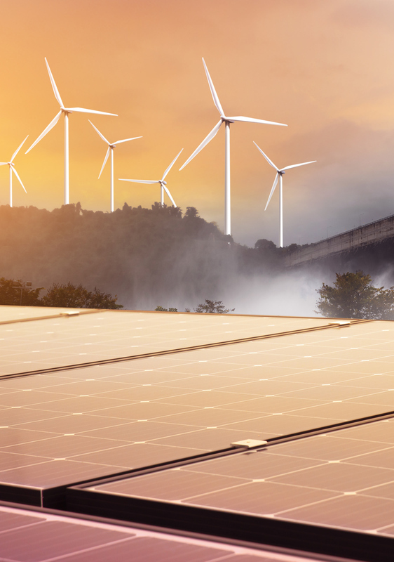 Electricity from solar panels, dams, and wind turbines. Environmentally-friendly renewable energy concept.